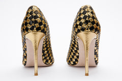 The Saks Tory Gold Black Handwoven Leather Pump Shoe