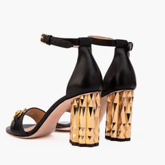 The Avlonya Block Heel Black Leather Ankle Strap Sandal