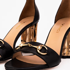 The Avlonya Block Heel Black Leather Ankle Strap Sandal