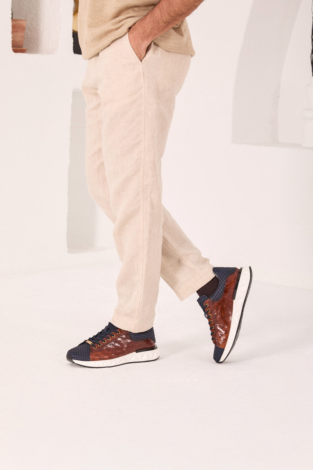 The Caesars Navy Tan Leather Sneaker