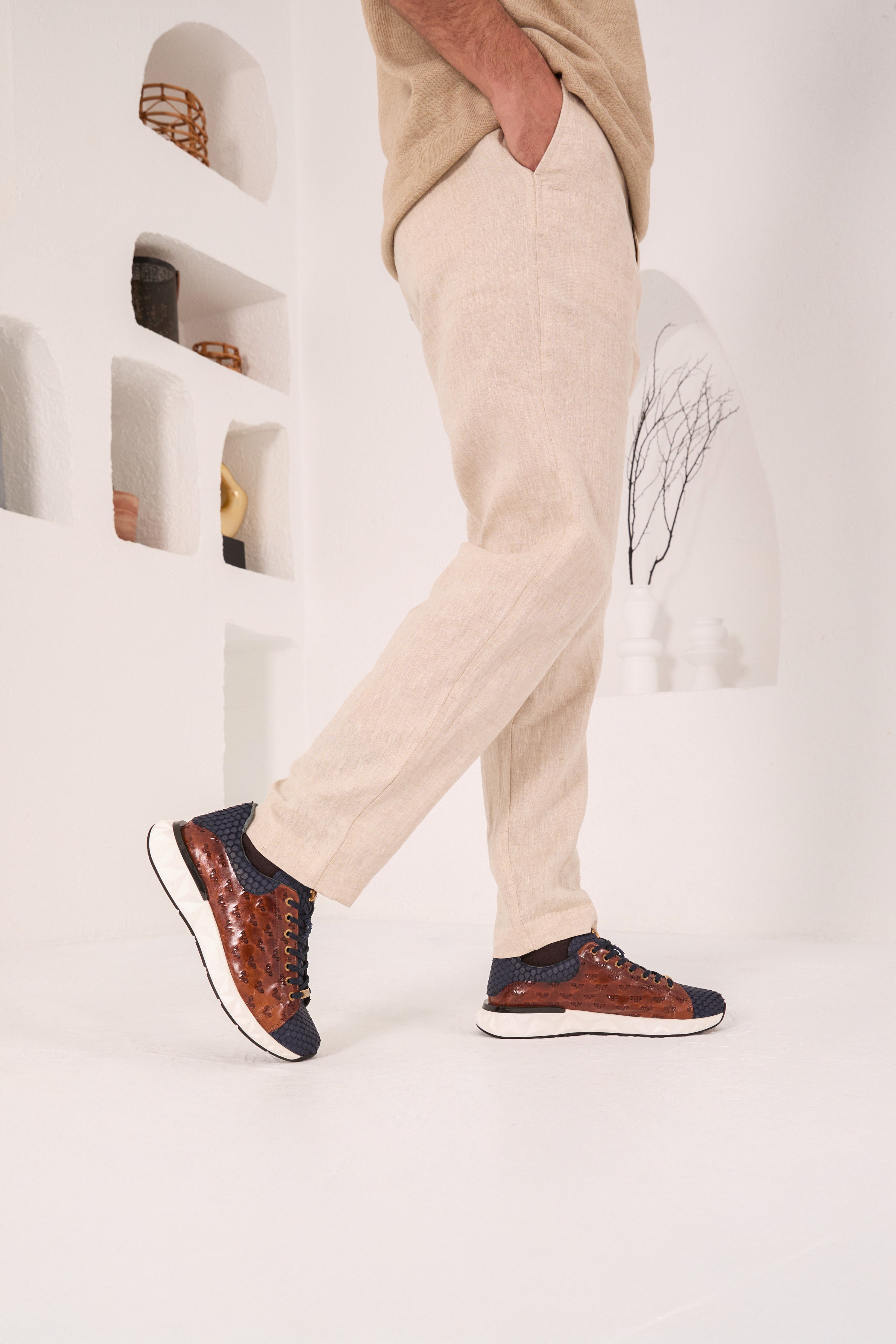 The Caesars Navy Tan Leather Sneaker