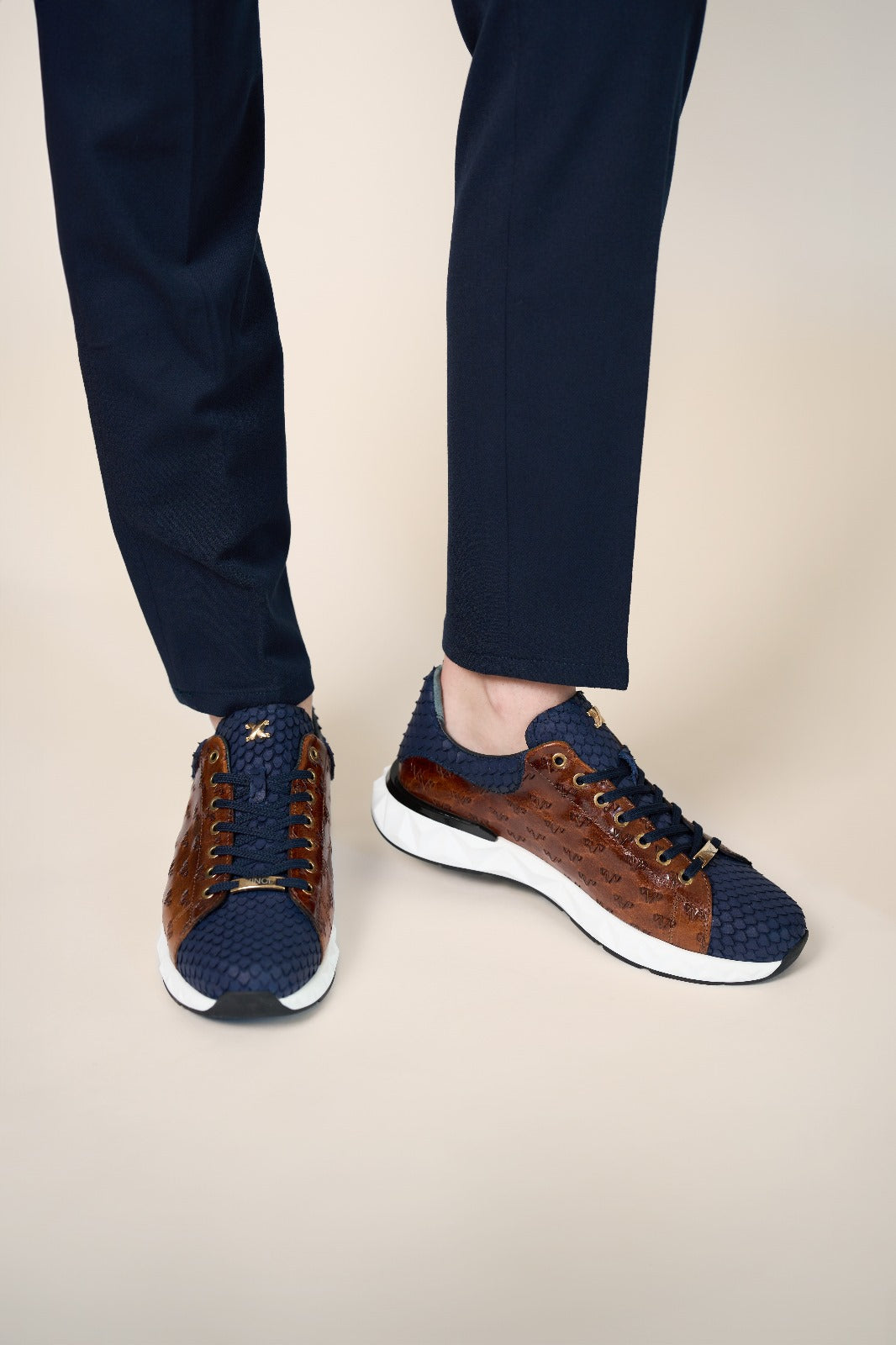 The Caesars Navy Tan Leather Sneaker