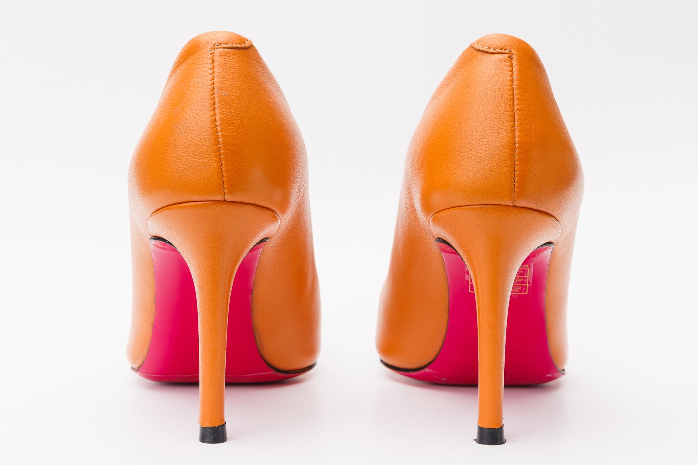 The Maneadero Orange Leather Pump Fuchsia Sole Shoe