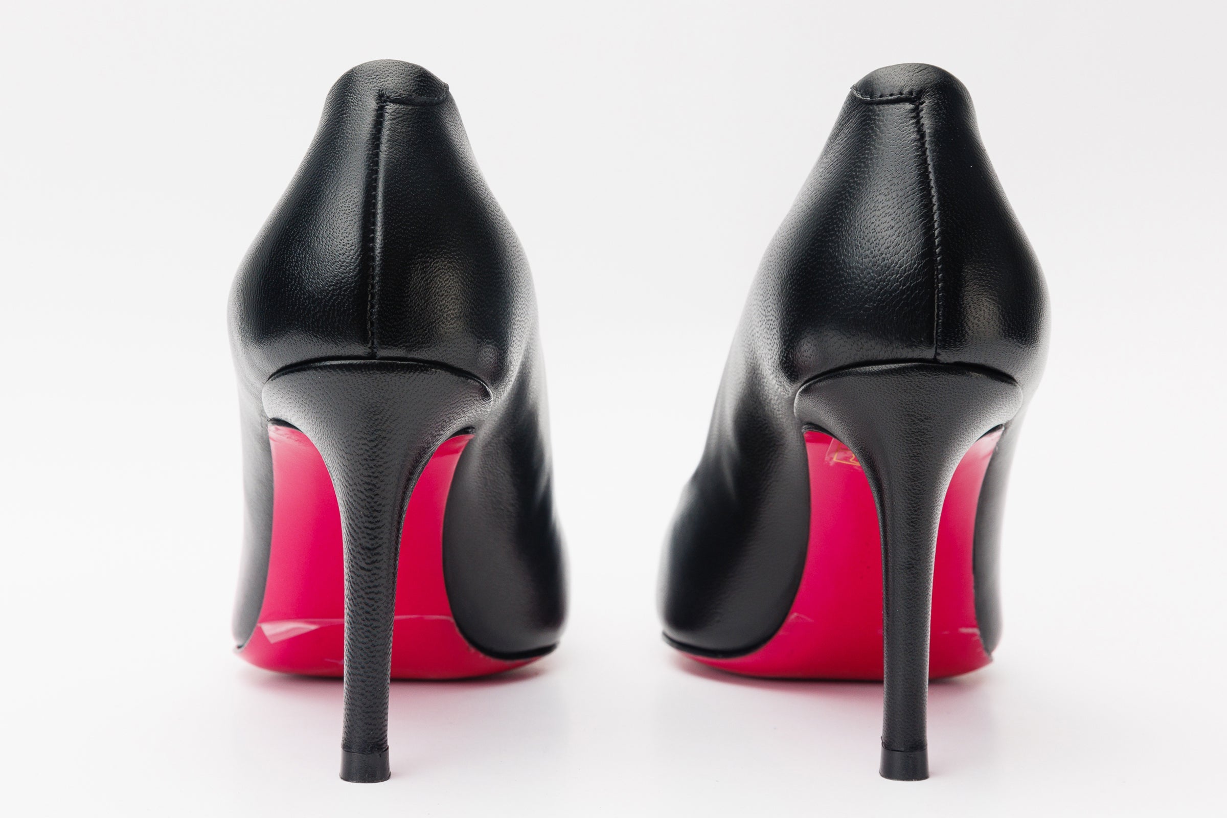The Maneadero Black Leather Pump Fuchsia Sole Shoe
