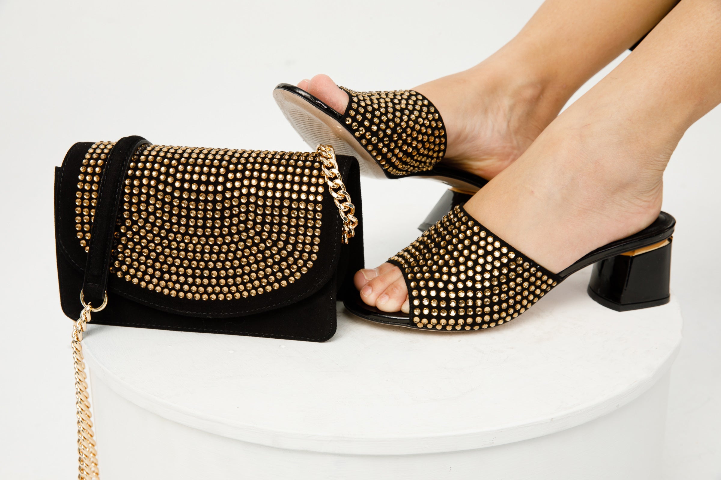 The Ailano Gold Glitter Leather Sandal