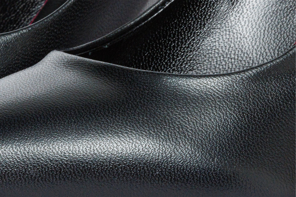 The Ege Black Leather Pump Fuchsia Sole Shoe