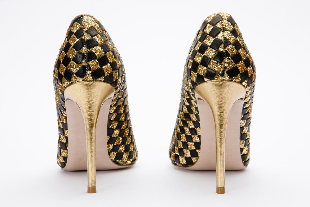 The Saks Tory Gold Black Handwoven Leather Pump Shoe